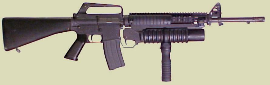 M203 with the M203 forward assist grip (handgrip) on the M16 rifle. The M203grip is manufactured by RM Equipment, Inc.