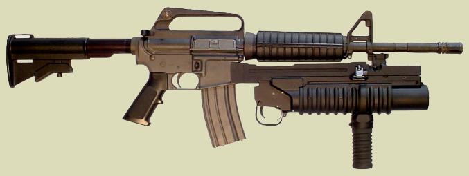 M203PI with the  M203 vertical grip (handgrip) on the M4 rifle. The M203grip is manufactured by RM Equipment, Inc. 