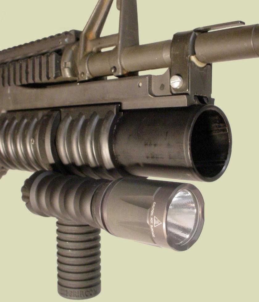 M203 with the M203grip and Tactical Light Module with the Surefire LED Head.